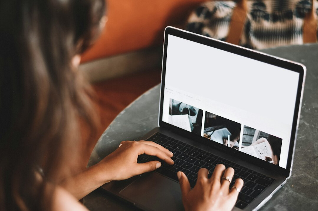 young woman using laptop